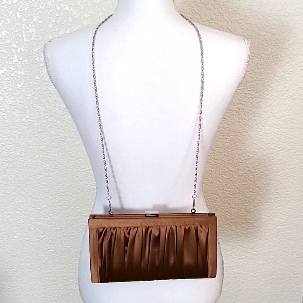 Le Chateau tan evening bag with silver chain strap
